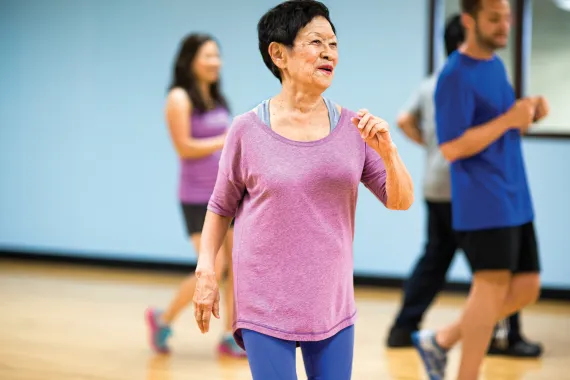 Group of people dancing in a group exercise 